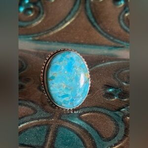 Kingman- the King of Turquoise. 
Gorgeous Blues Ring
7 1/2
.925 Sterling